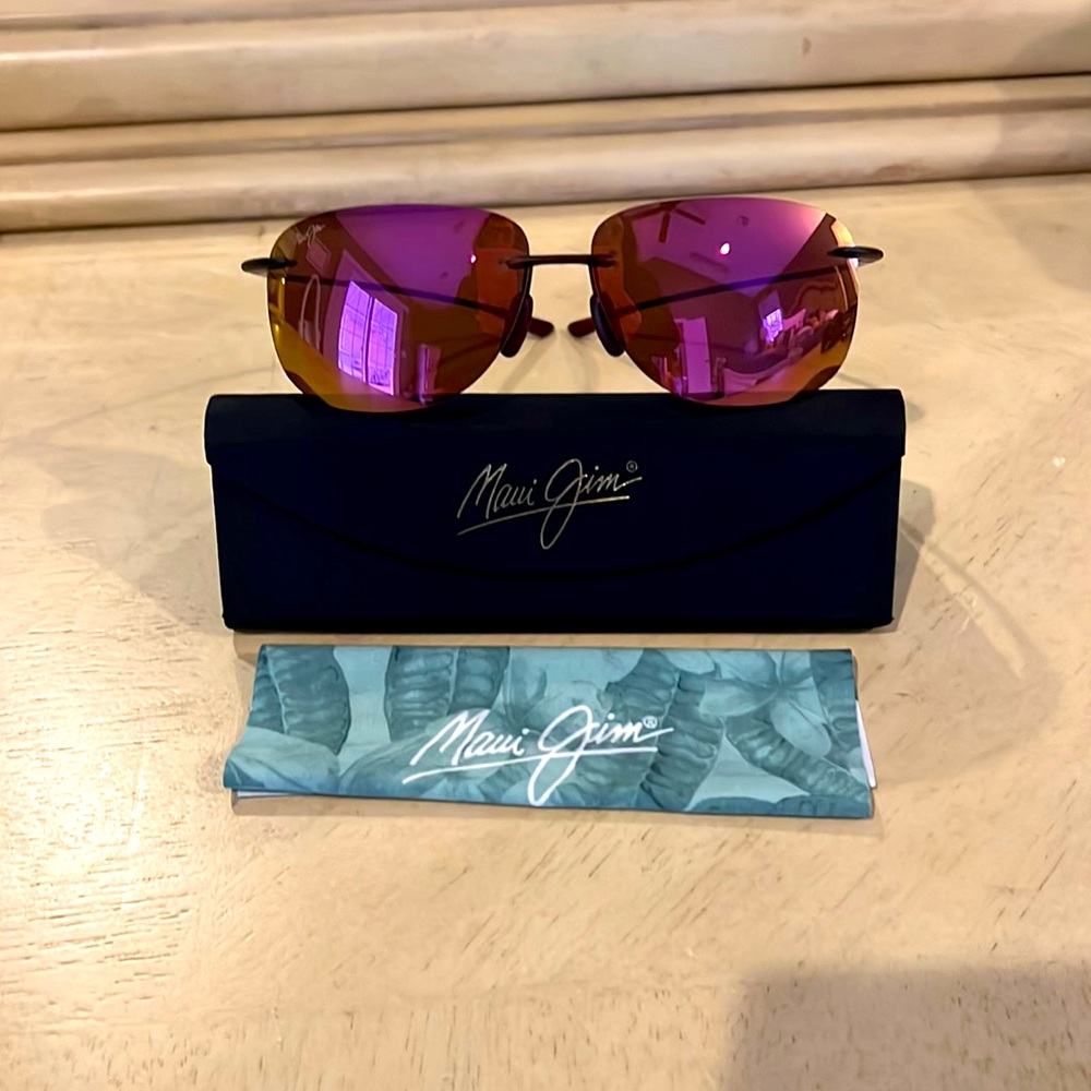 Maui Jim pink tint minor imperfections from use with case and cloth